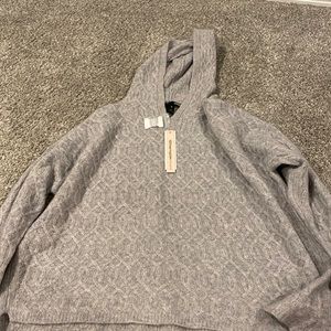 Bloomingdales knitt hooded sweater size large, tags still attached